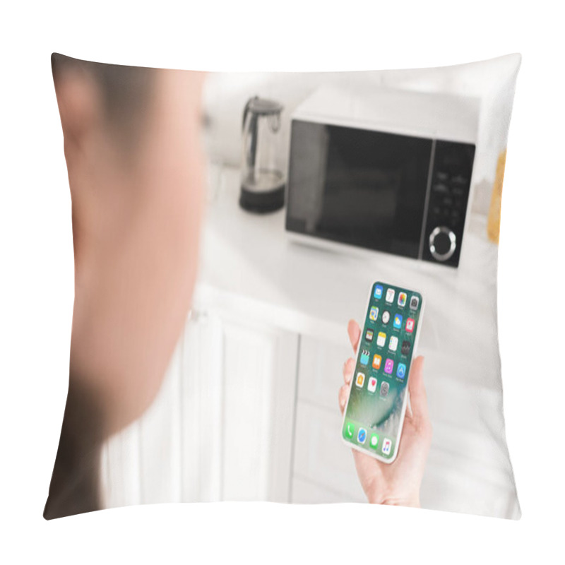 Personality  KYIV, UKRAINE - OCTOBER 9, 2019: Cropped View Of Woman Holding Smartphone With Apple Interface Pillow Covers