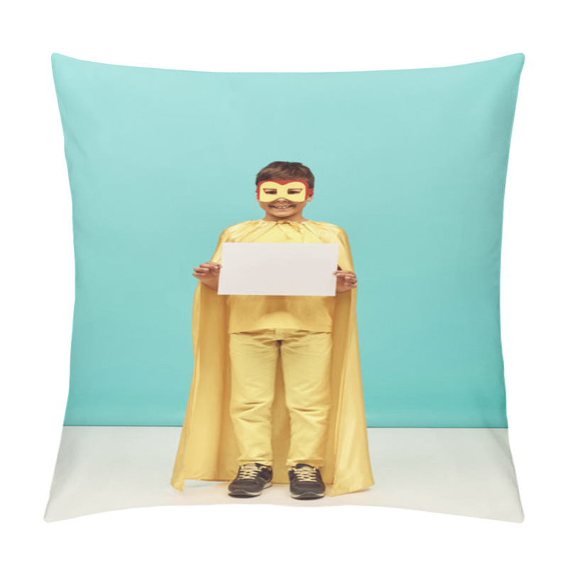 Personality  Full Length Of Positive Multiracial Boy In Yellow Superhero Costume With Mask Holding Blank Paper On Blue Background, International Child Protection Day Concept  Pillow Covers