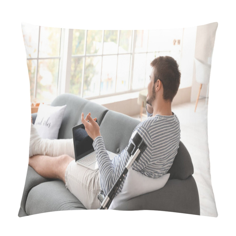 Personality  Young Man With Broken Leg Using Laptop While Talking By Phone At Home Pillow Covers