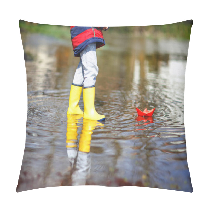 Personality  Happy Little Kid Boy In Yellow Rain Boots Playing With Paper Ship Boat By Huge Puddle On Spring Or Autumn Day. Active Leisure For Children. Funny Child Having Fun Outdoors, Wearing Colorful Clothes. Pillow Covers