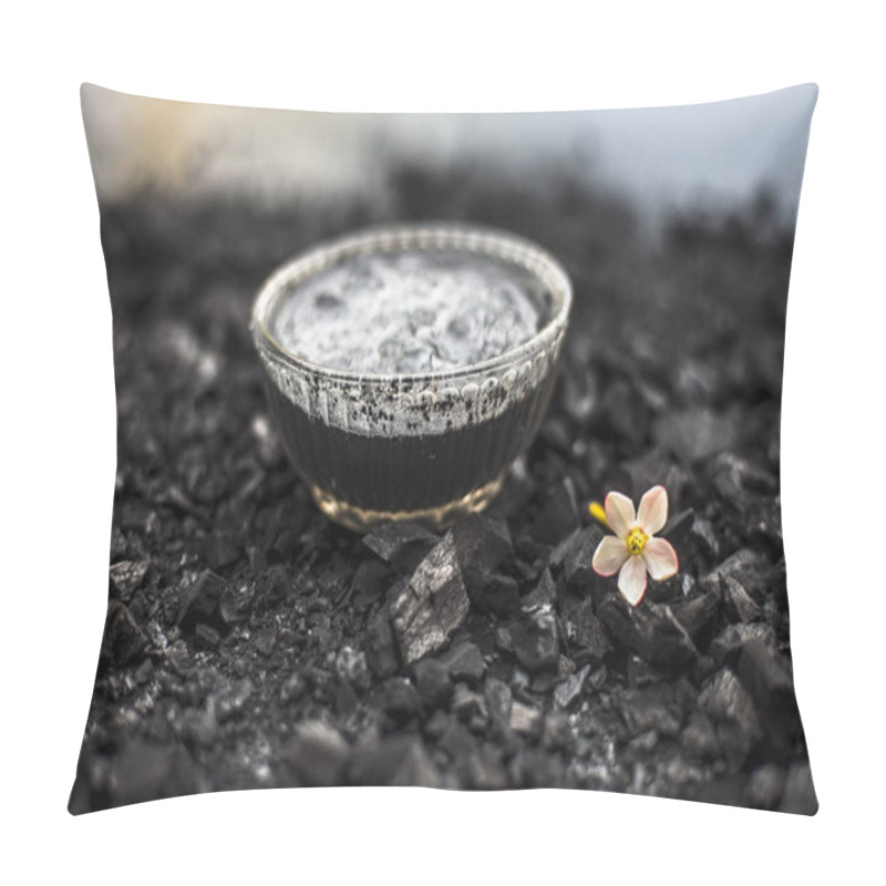 Personality  Close Up Of Activated Charcoal In A Glass Bowl On The Wooden Surface Along With Some Raw Powder Of Charcoal Or Coal Spread On The Surface. Pillow Covers