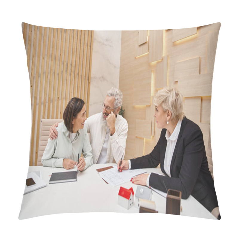 Personality  Cheerful Middle Aged Married Couple Smiling Near Female Realtor And Discussing Project Of New Home Pillow Covers