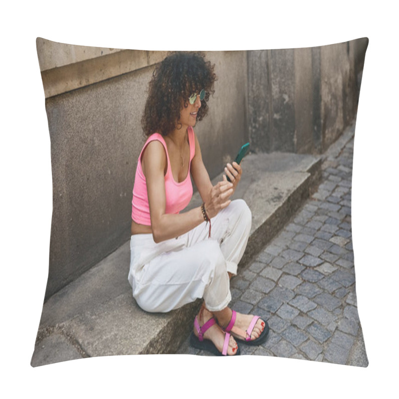 Personality  A Woman Wearing Stylish Attire Sits On A Step In A European City, Checking Her Phone. Pillow Covers