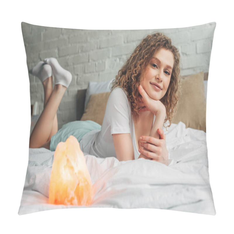 Personality  Smiling Girl Lying On Bed With Himalayan Salt Lamp, Selective Focus Pillow Covers