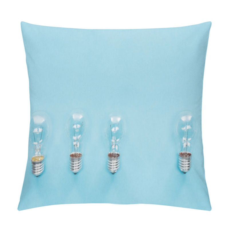 Personality  Top View Of Three Light Bulbs In Row And One Aside, Having New Idea Concept Pillow Covers