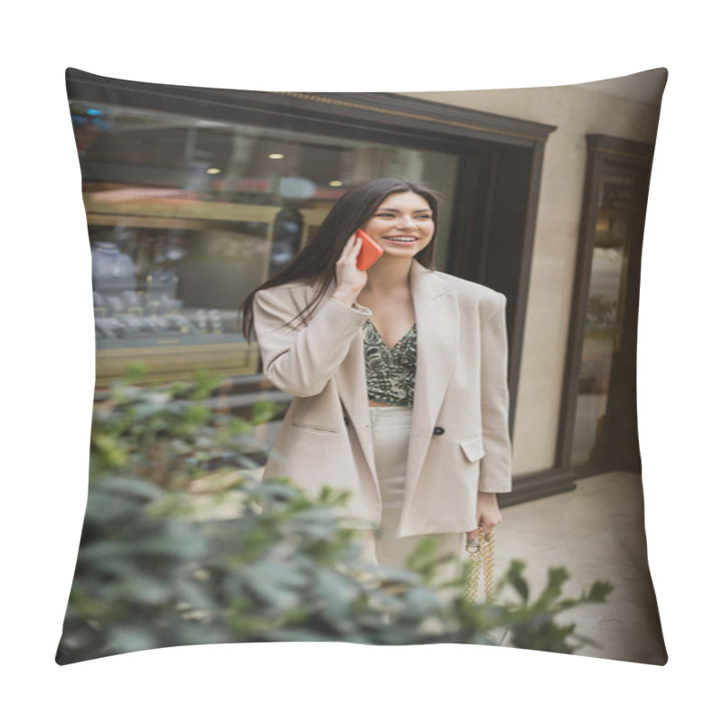 Personality  Smiling Young Woman With Brunette Long Hair And Makeup Talking On Smartphone And Standing In Trendy Outfit With Handbag On Chain Strap Near Blurred Jewelry Store And Plant In Istanbul  Pillow Covers