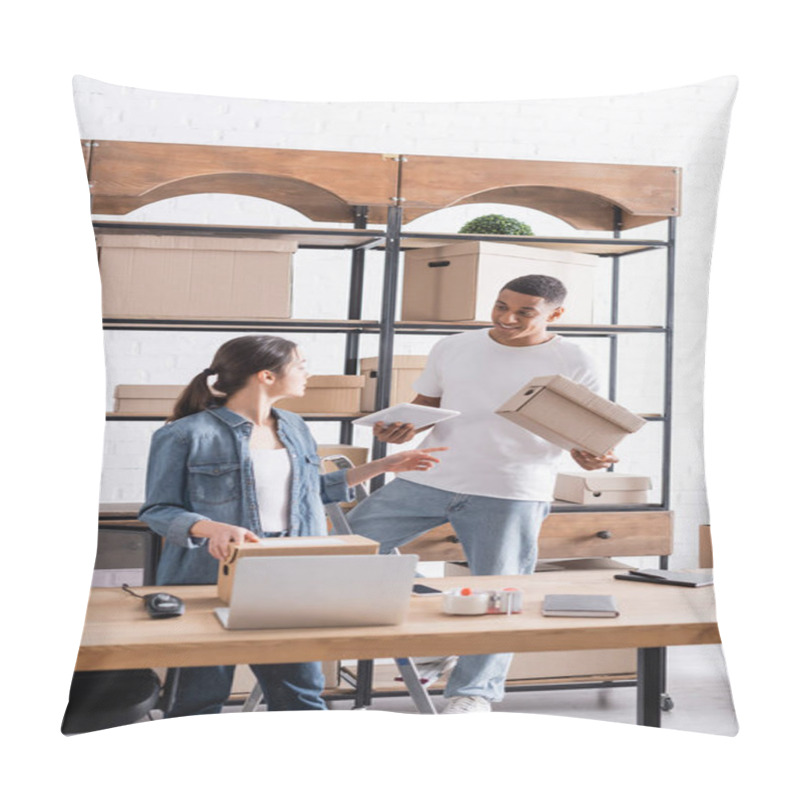 Personality  Smiling African American Seller Holding Carton Box And Digital Tablet Near Colleague In Online Web Store  Pillow Covers