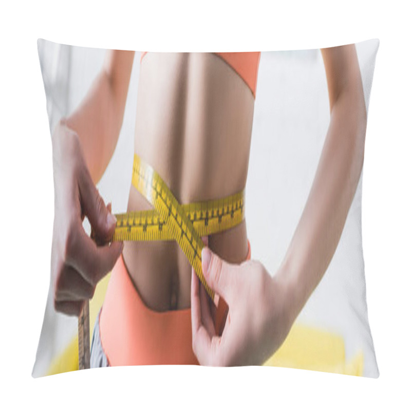 Personality  Panoramic Shot Of Sportswoman Measuring Thin Waist With Tape At Home Pillow Covers