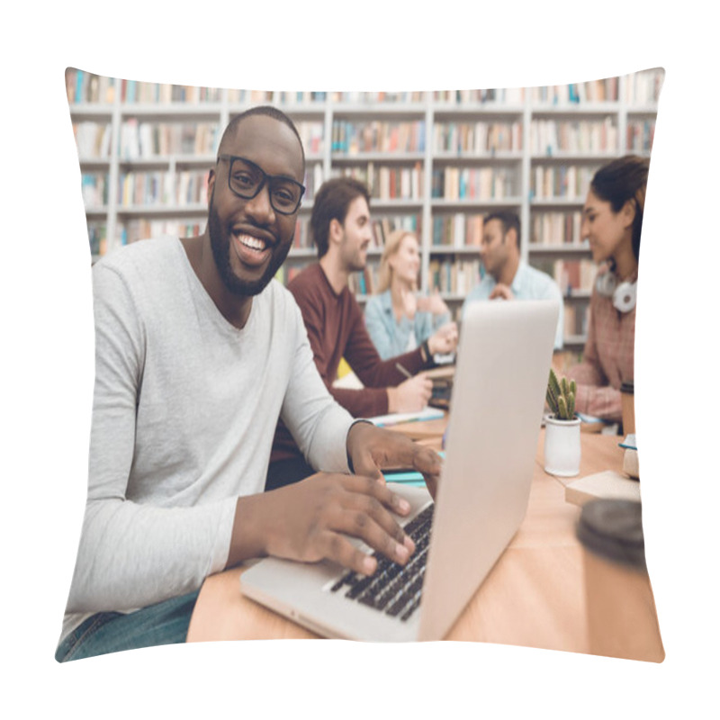 Personality  Group Of Ethnic Multicultural Students Sitting At Table In Library, Black Guy Typing On Laptop Pillow Covers