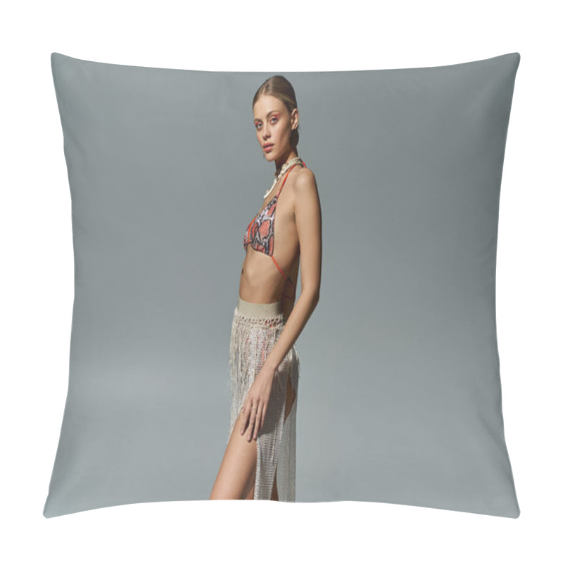 Personality  Fashionable Woman With Blonde Hair Striking A Pose In Bikini And Fringe Skirt Against Grey Background. Pillow Covers