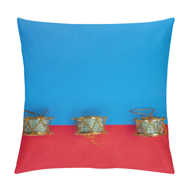 Personality  Three Beautifully Arranged Traditional Xmas Decorative Drums Set Against A Vibrant Blue And Red Background, Perfect For Holiday Celebrations, Cultural Designs, And Seasonal Decorations. Pillow Covers