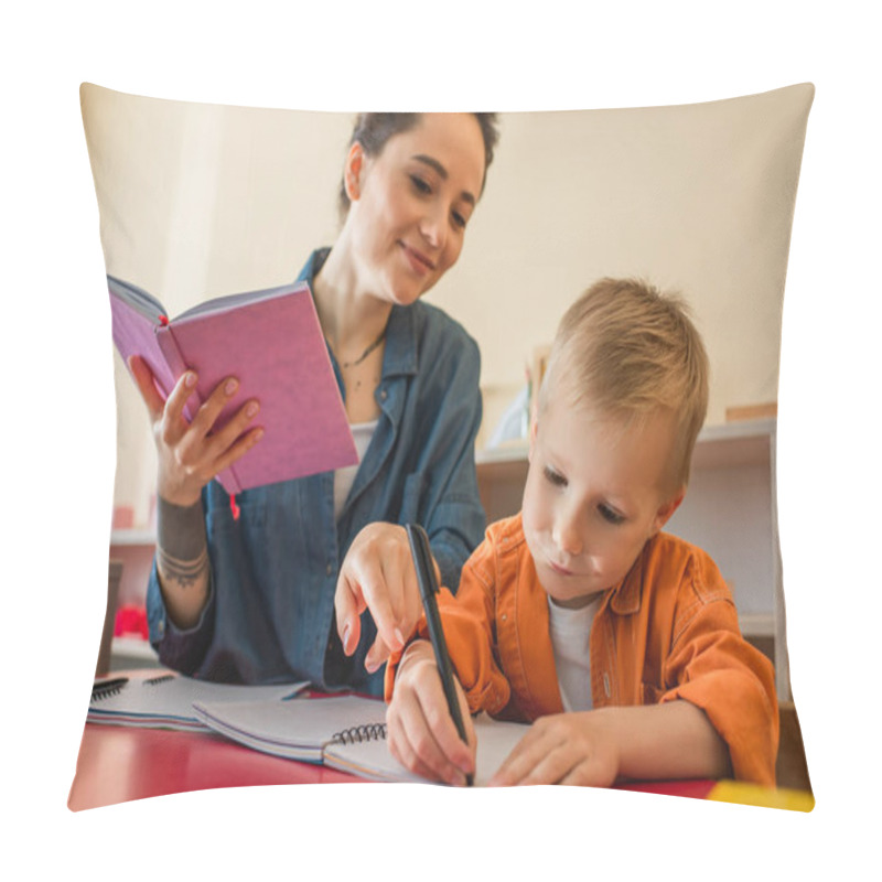 Personality  Smiling Teacher Pointing With Finger Near Kid Writing Dictation In Montessori School Pillow Covers