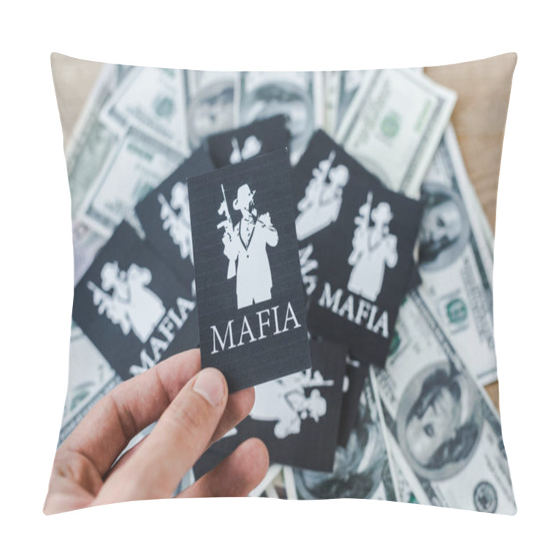 Personality  KYIV, UKRAINE - NOVEMBER 22, 2019: Cropped View Of Man Holding Playing Card With Mafia Letters Near Cash On Table  Pillow Covers