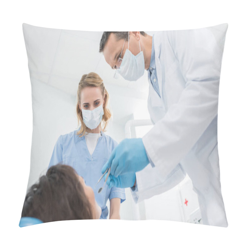 Personality  Male Dentist And His Female Assistant Checking Patient In Modern Dental Clinic Pillow Covers