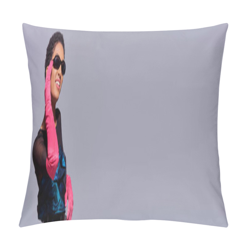 Personality  Happy African American Woman In Pink Gloves And Cocktail Dress Touching Sunglasses And Smiling While Standing Isolated On Grey, Modern Generation Z Fashion Concept, Banner  Pillow Covers