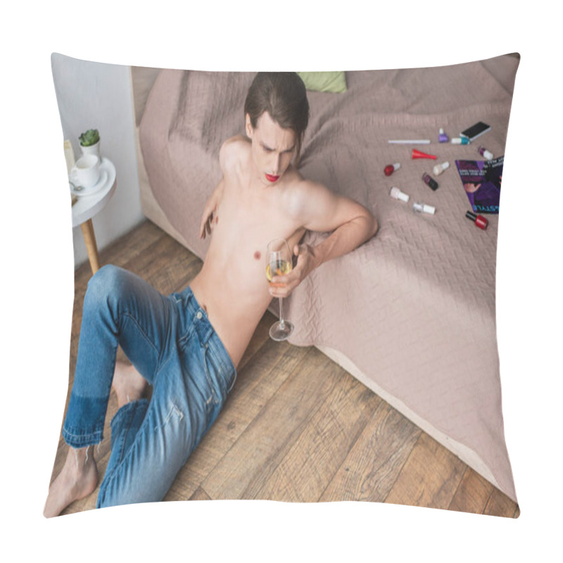 Personality  High Angle View Of Young Transgender Man Holding Glass Of Wine While Sitting Near Bed With Makeup Products  Pillow Covers