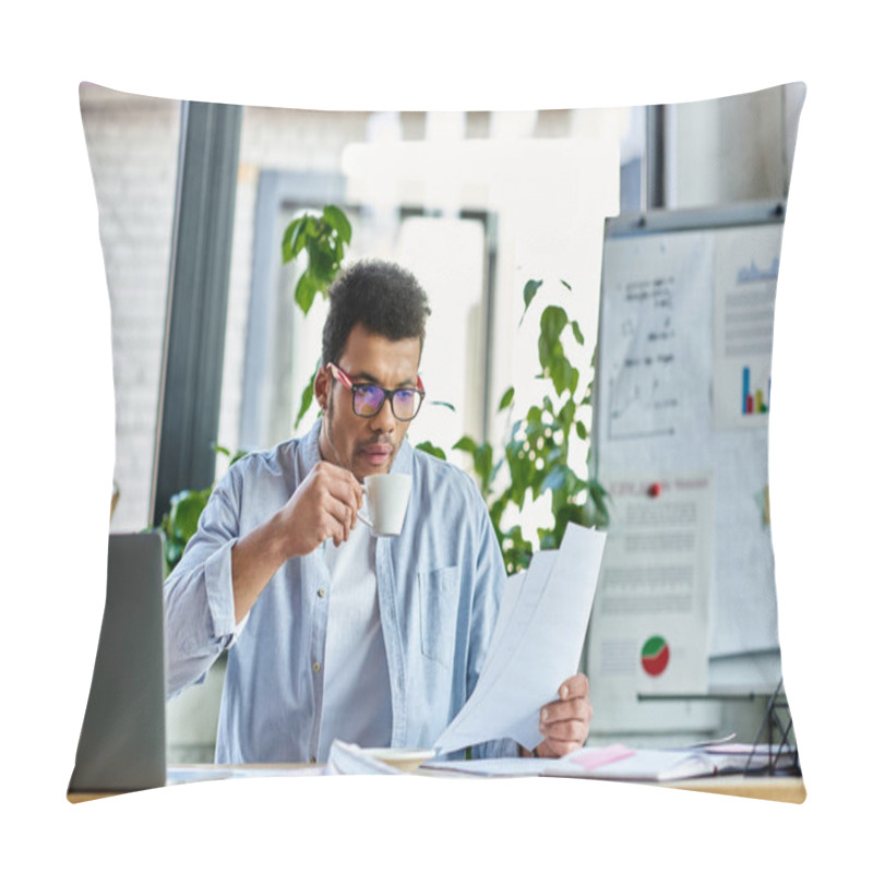 Personality  Focused Individual Sipping Coffee As He Reviews Documents In A Cheerful Office Environment. Pillow Covers