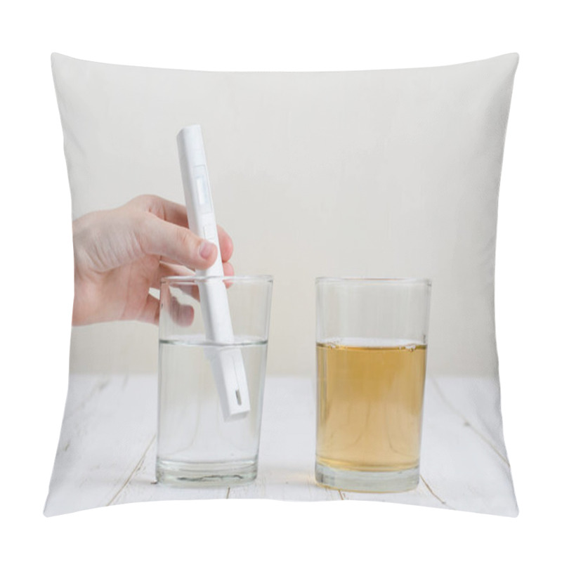 Personality  A Hand With A Device For Testing Water Makes A Measurement In A Glass With Transparent Water. Nearby Is A Glass Of Dirty Water. Pillow Covers