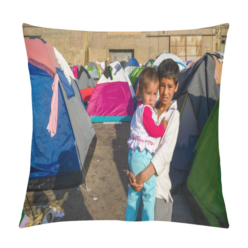 Personality  Boy With Little Sister In His Arms In A Tent Camp For Syrian Refugees In The Greek Port. Pillow Covers