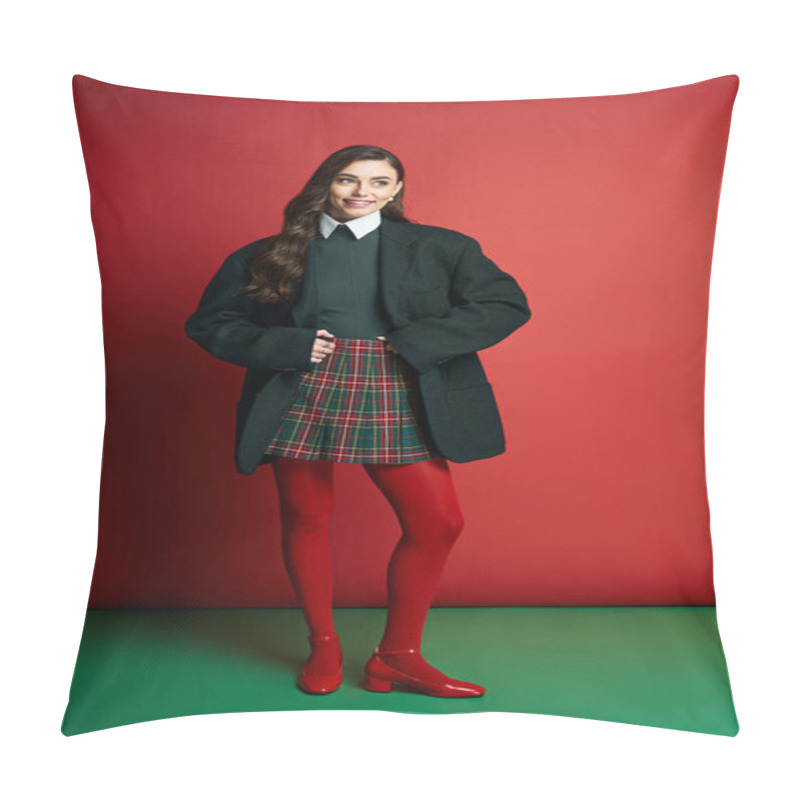 Personality  Trendy Young Woman Stands With Poise, Showcasing Her Stylish Outfit Against A Bold Red Background. Pillow Covers