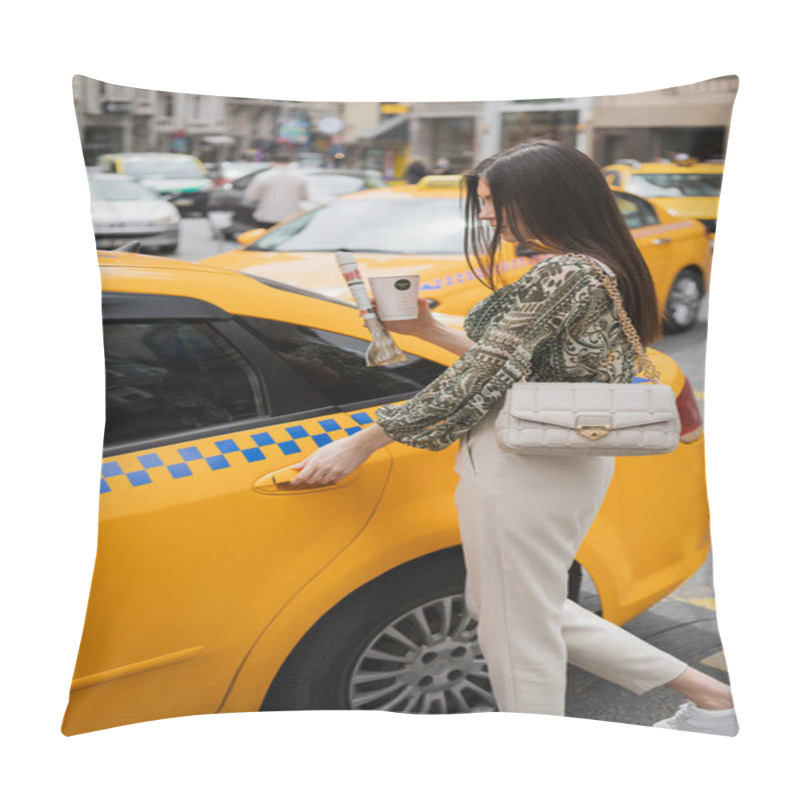 Personality  Chic Woman With Long Hair Holding Paper Cup With Coffee And Newspaper While Standing In Trendy Outfit With Handbag On Chain Strap Near Yellow Taxi On Blurred Urban Street In Istanbul  Pillow Covers