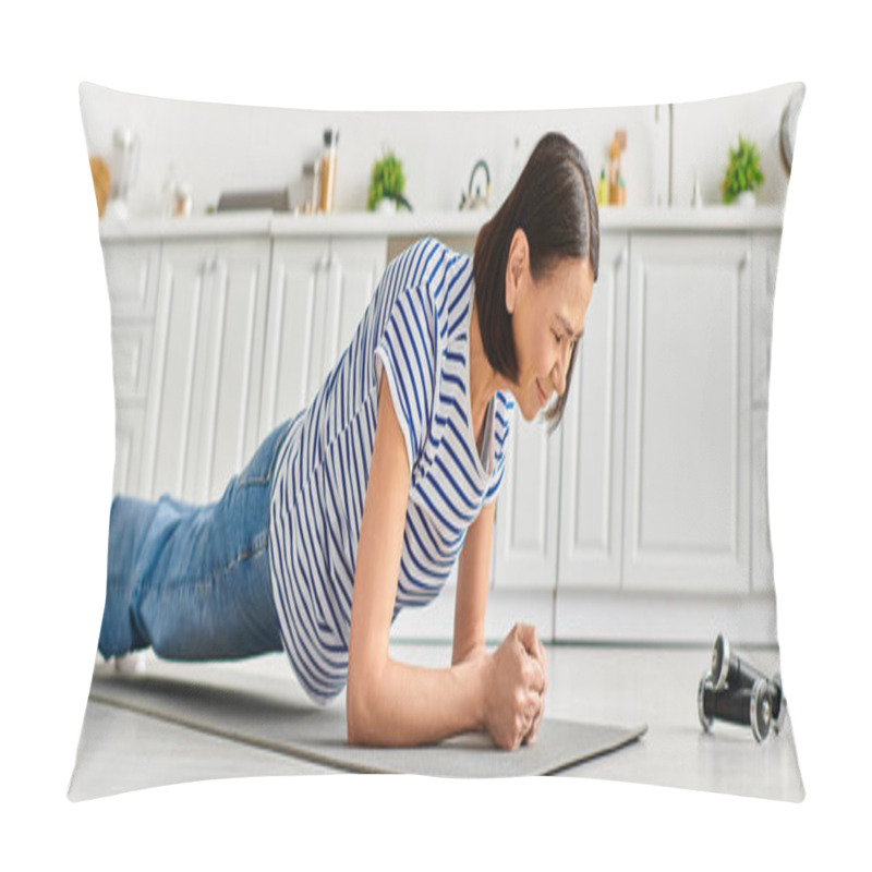 Personality  A Mature Woman In Homewear Practices Yoga On A Kitchen Mat. Pillow Covers