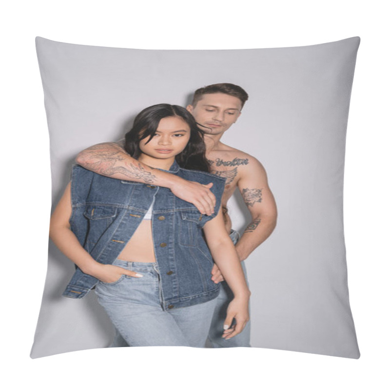 Personality  Shirtless Tattooed Man Embracing Asian Woman Posing With Hand In Pocket Of Jeans On Grey Background Pillow Covers