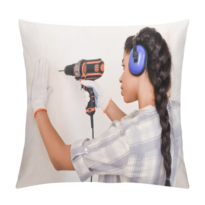 Personality  Focused African American Woman In Protective Headphones And Gloves Working With Power Drill  Pillow Covers