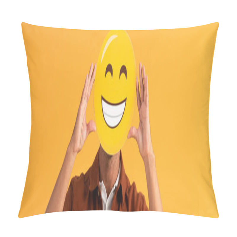 Personality  KYIV, UKRAINE - SEPTEMBER 24, 2019: Panoramic Shot Of Man Covering Face With Happy Emoticon Isolated On Orange  Pillow Covers