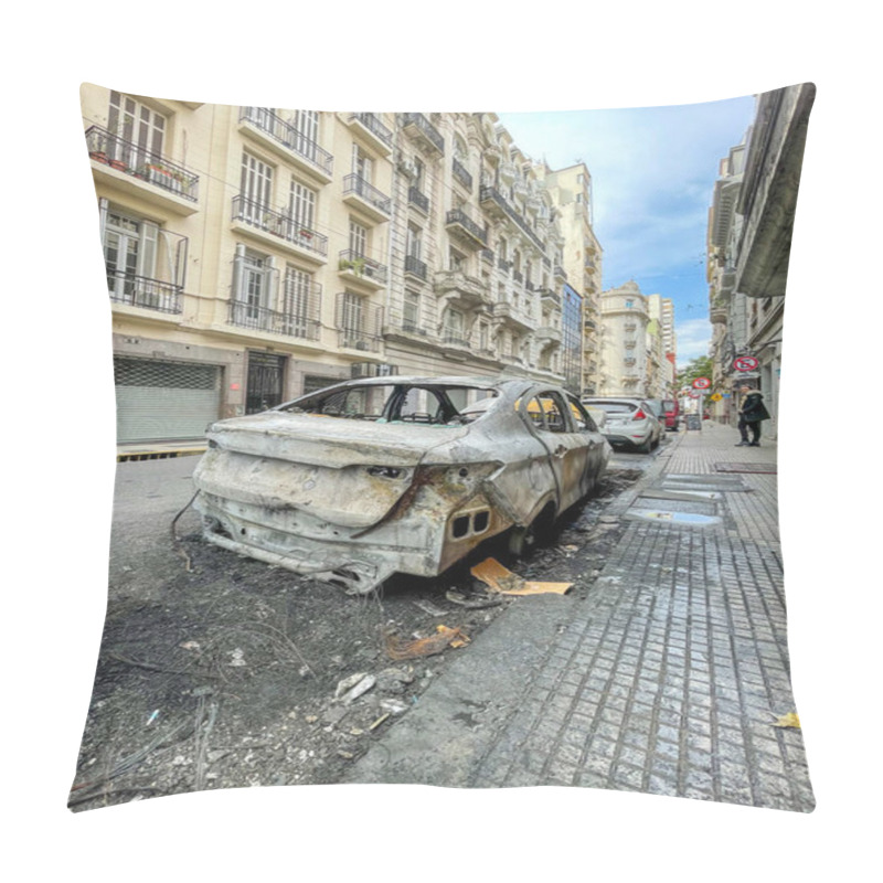 Personality  A Burnt Out Car Sits On A Sidewalk In Buenos Aires, Surrounded By Apartment Buildings, Trash, And Debris, Depicting Urban Decay In The Citys Streets. Pillow Covers