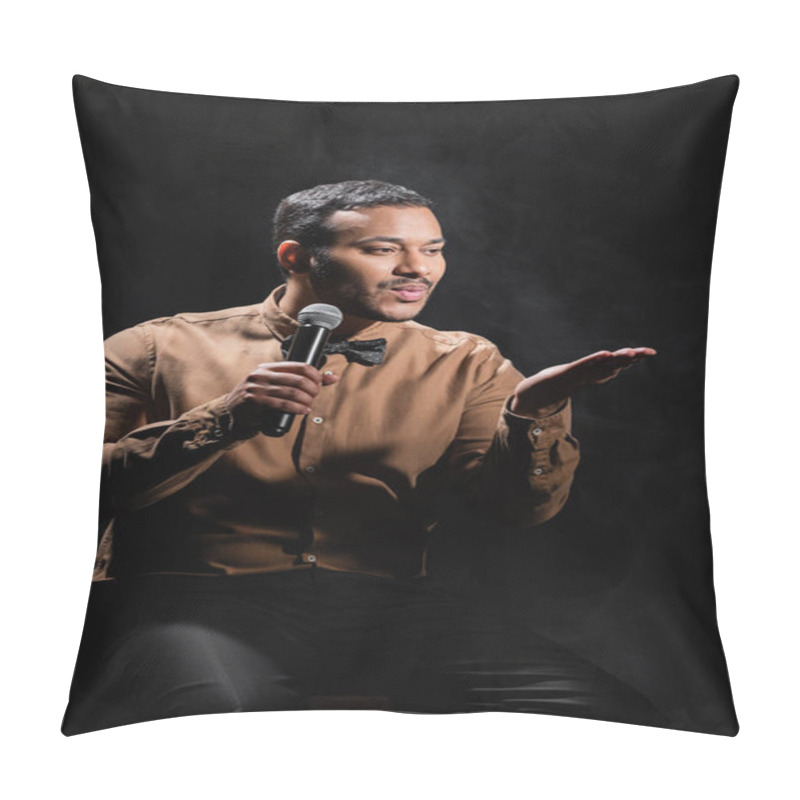 Personality  Indian Comedian Sitting And Pouting Lips While Performing Stand Up Comedy Into Microphone On Black  Pillow Covers