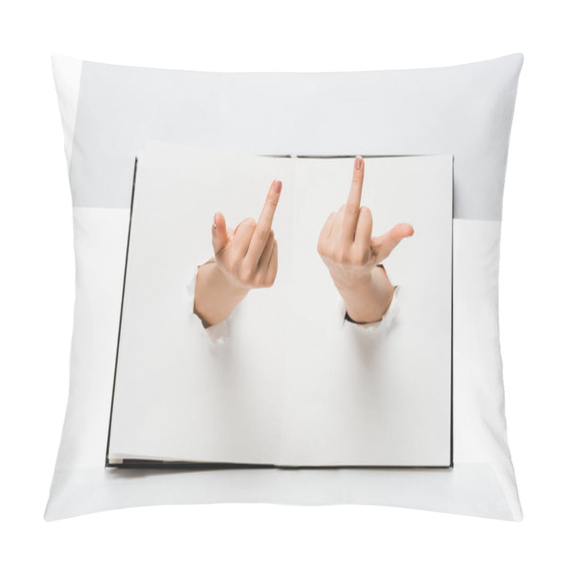 Personality  Cropped Shot Of Woman Showing Middle Fingers Through Holes On White Pillow Covers