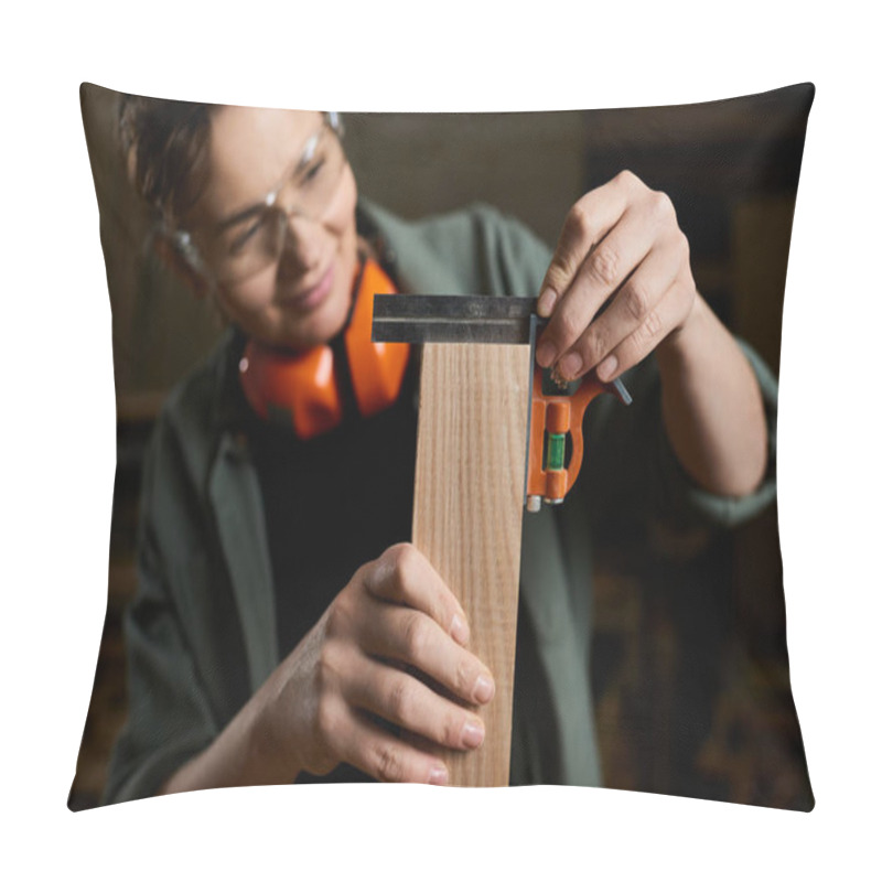 Personality  A Skilled Female Carpenter Focuses On Accurate Measurements While Working On Wood In Her Workshop. Pillow Covers