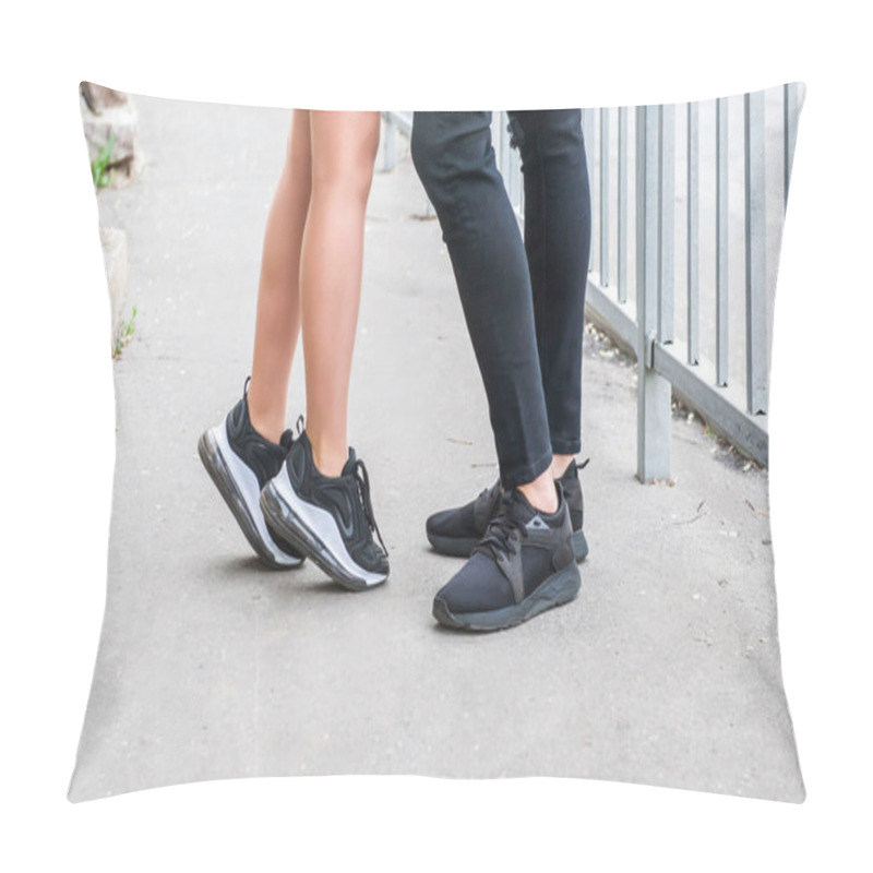 Personality  Detail Of A Romantic Couple On A Walk In The City. Side View Of Male And Female Legs In Sneakers Pillow Covers