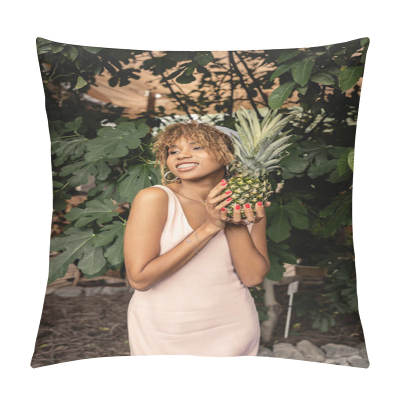 Personality  Pleased African American Woman With Braces Wearing Summer Outfit And Holding Pineapple While Standing In Indoor Garden At Background, Woman In Summer Outfit Posing Near Lush Tropical Plants Pillow Covers