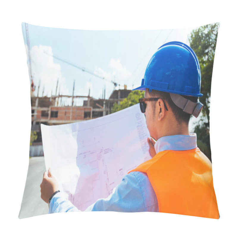 Personality  Asian Man Civil Engineer Wearing Blue Safety Helmet Checking Working Progress At Construction Site. Pillow Covers