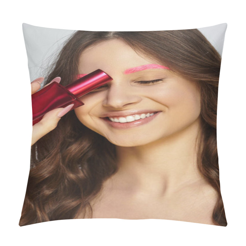 Personality  A Young Woman Showcases Her Striking Pink Eyebrows While Playfully Holding A Vibrant Beauty Product. Pillow Covers