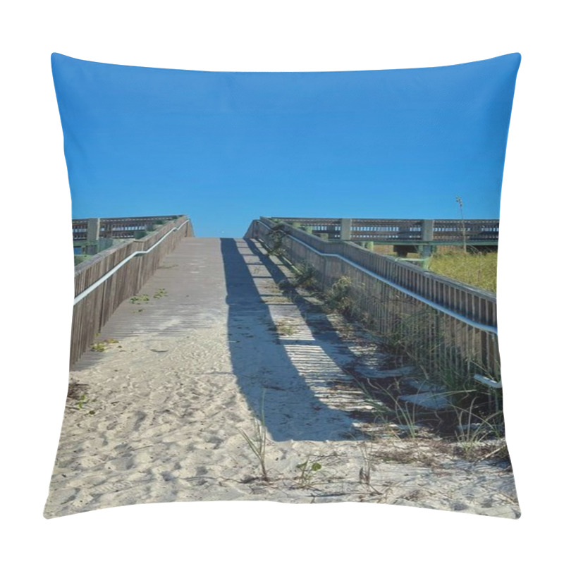 Personality  A Sunlit Wooden Boardwalk Leads Over Sandy Dunes, Framed By Railings And Casting Long Shadows. The Vibrant Blue Sky Above Creates A Mood Of Anticipation And Serenity, Inviting A Seaside Adventure. Pillow Covers