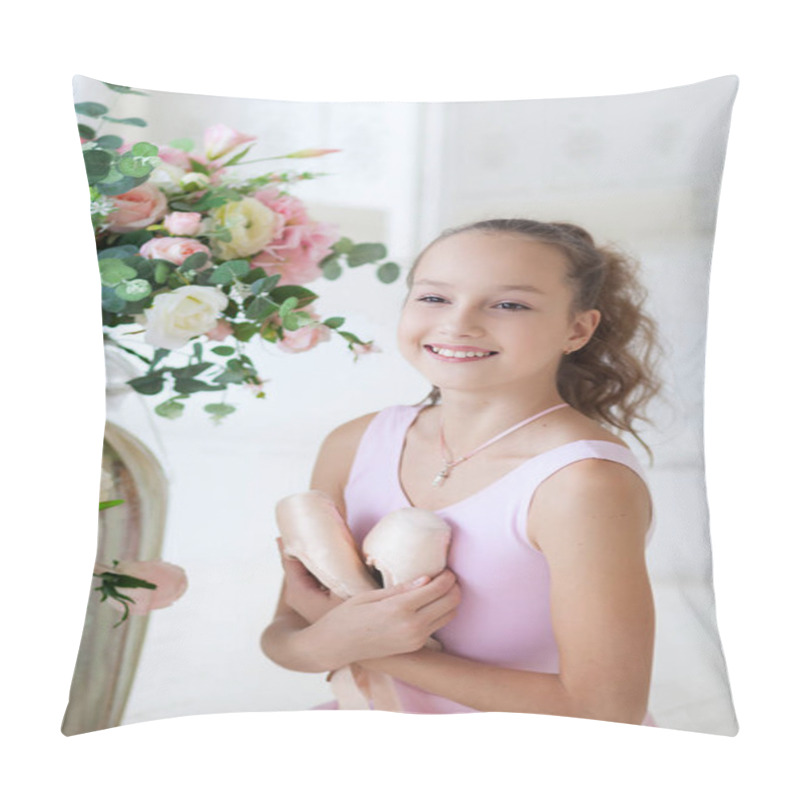 Personality  A Cute Ballerina In A Ballet Pink Costume Is Sitting On The Floor With Pointe In Her Hands And Smiling. Girl In The Dance Class. The Girl Is Studying Ballet. Classical Ballet, Dance. Ballet Studio. Pillow Covers