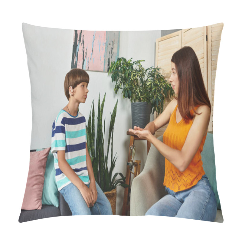 Personality  A Mother Teaches Her Hearing Impaired Son Using Sign Language In Their Cozy Living Room. Pillow Covers