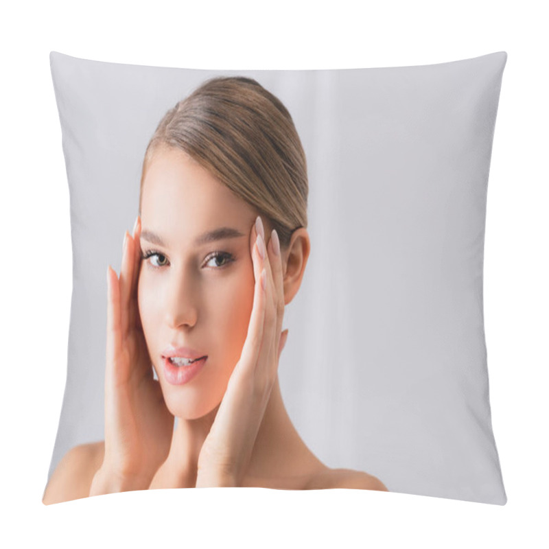 Personality  Young Woman With Bare Shoulders Looking At Camera And Touching Face On White Pillow Covers