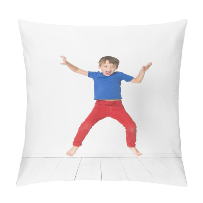 Personality  Cool, Young And Cute Boy With Blue Shirt And Red Trousers Is Jumping High In The Studio In Front Of White Background And White Wooden Floor Pillow Covers