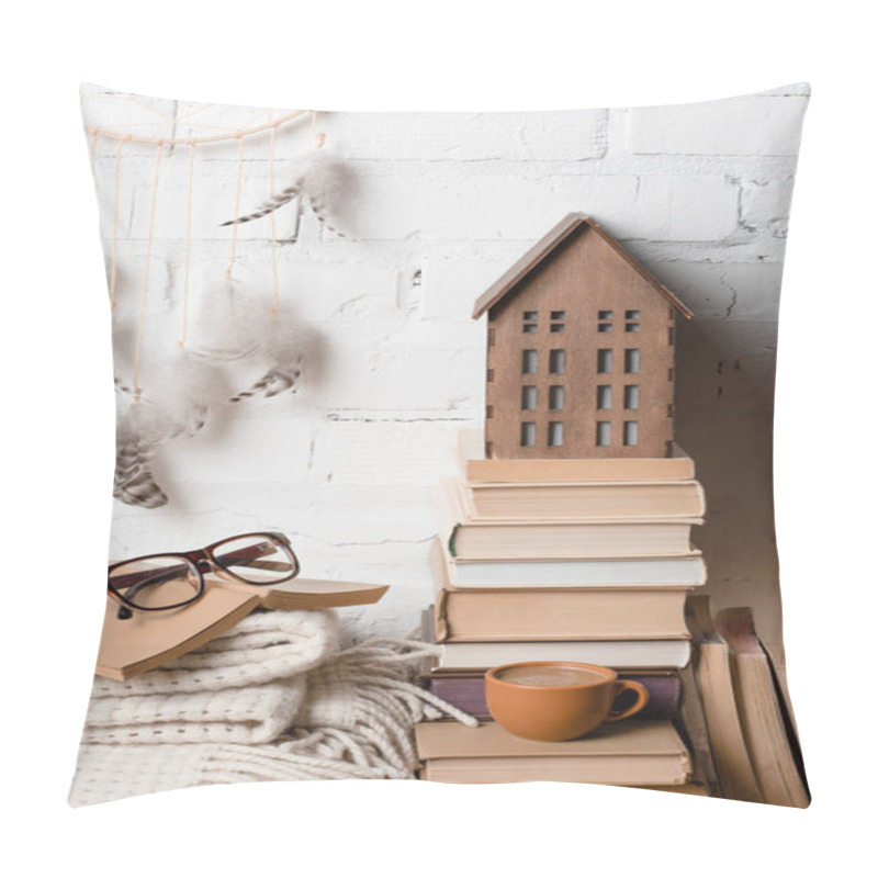 Personality  Books, Cup Of Coffee, Eyeglasses, Blanket And Dream Catcher Near White Brick Wall Pillow Covers