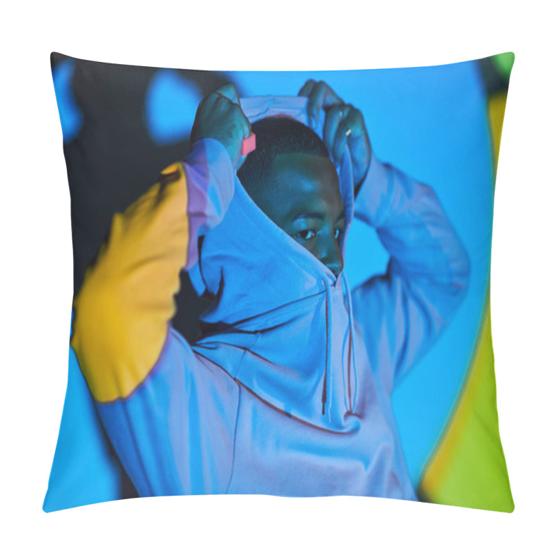 Personality  Good Looking Young Man Posing While Putting On Hood In Digital Projector Lights, Fashion Concept Pillow Covers