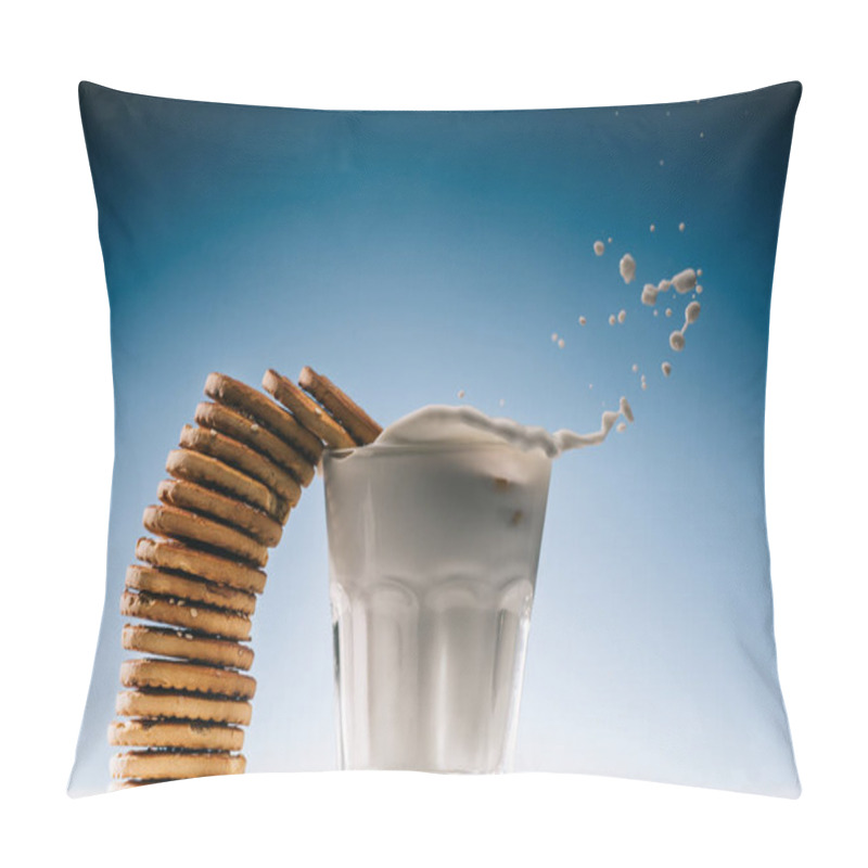 Personality  Stack Of Biscuits Splashing Into Glass Of Milk Isolated On Blue Background Pillow Covers