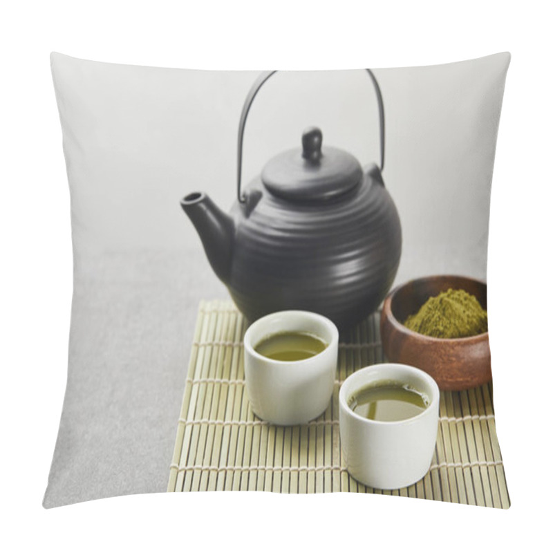 Personality  Selective Focus Of Green Matcha Powder In Wooden Bowl Near Black Teapot And Cups With Tea On Bamboo Table Mat Pillow Covers