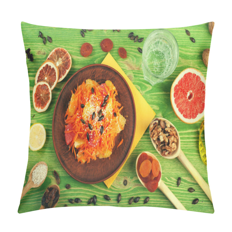 Personality  Concept Diet Food. Breakfast. Carrot-apple Salad With Dried Fruit And Nuts In A Brown Earthenware Dish. Around Half A Grapefruit, Nuts, Raisins And A Glass Of Water. Low-calorie Dish That Promotes Weight Loss. Green Wooden Background. View From Above Pillow Covers