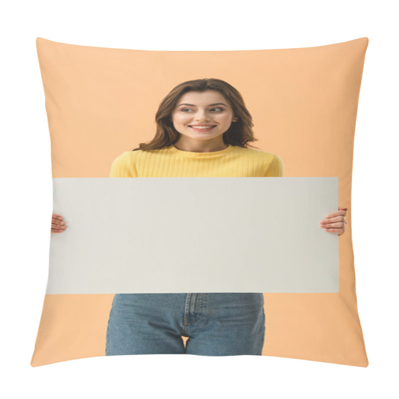 Personality  Blissful Smiling Brunette Girl Holding Blank Placard Isolated On Orange Pillow Covers