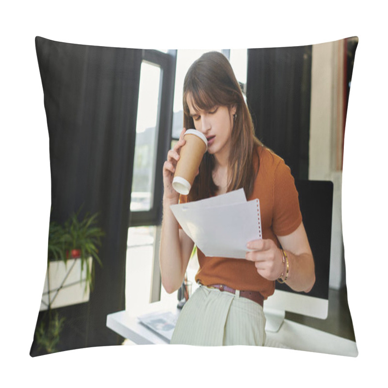 Personality  In A Modern Office, A Young Non Binary Person Thoughtfully Examines Papers With Coffee In Hand. Pillow Covers