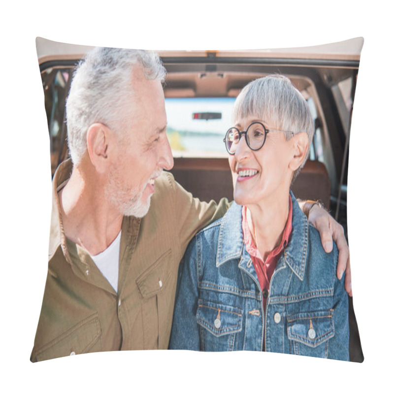 Personality  Smiling Senior Couple Embracing And Looking At Each Other Near Car Pillow Covers